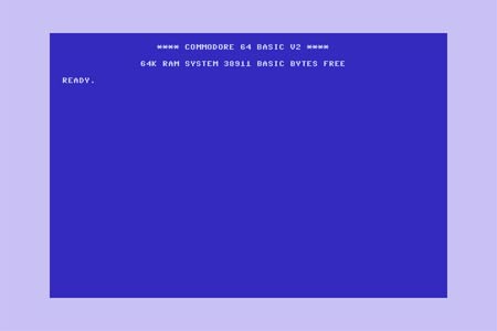 این صفحه بالا آمدن Commodore 64 را نشان می‌دهد. این رایانه از نسخه‌ای از زبان برنامه نویسی Basic استفاده می‌کرد.